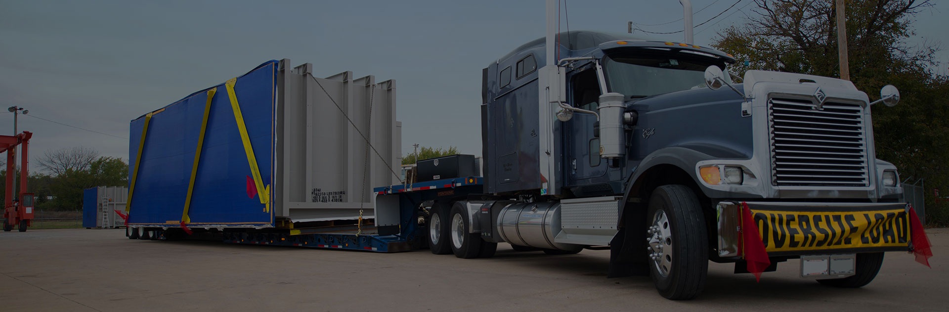 Image of a truck outside of a loading dock.